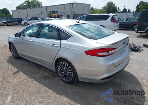 2017 Ford Fusion Hybrid Titanium from USA, damaged, VIN 3FA6P0RUXHR187969